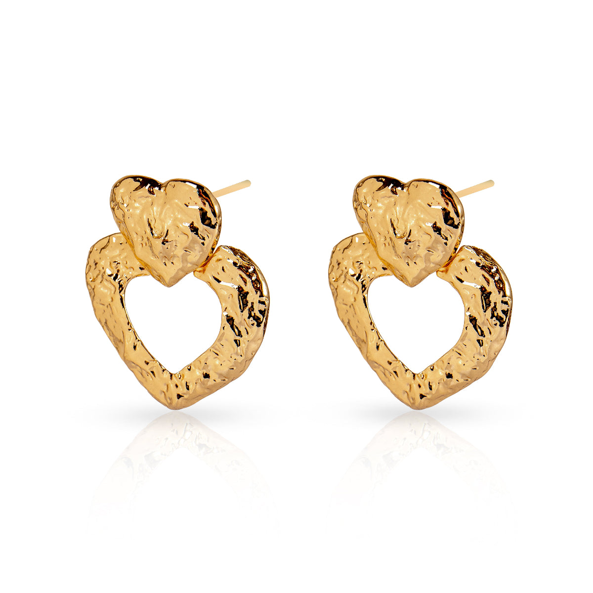Gold heart-shaped earrings on a white background